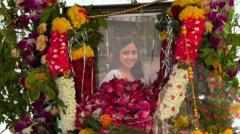 Families mark a year of Air India crash with vigils and prayers