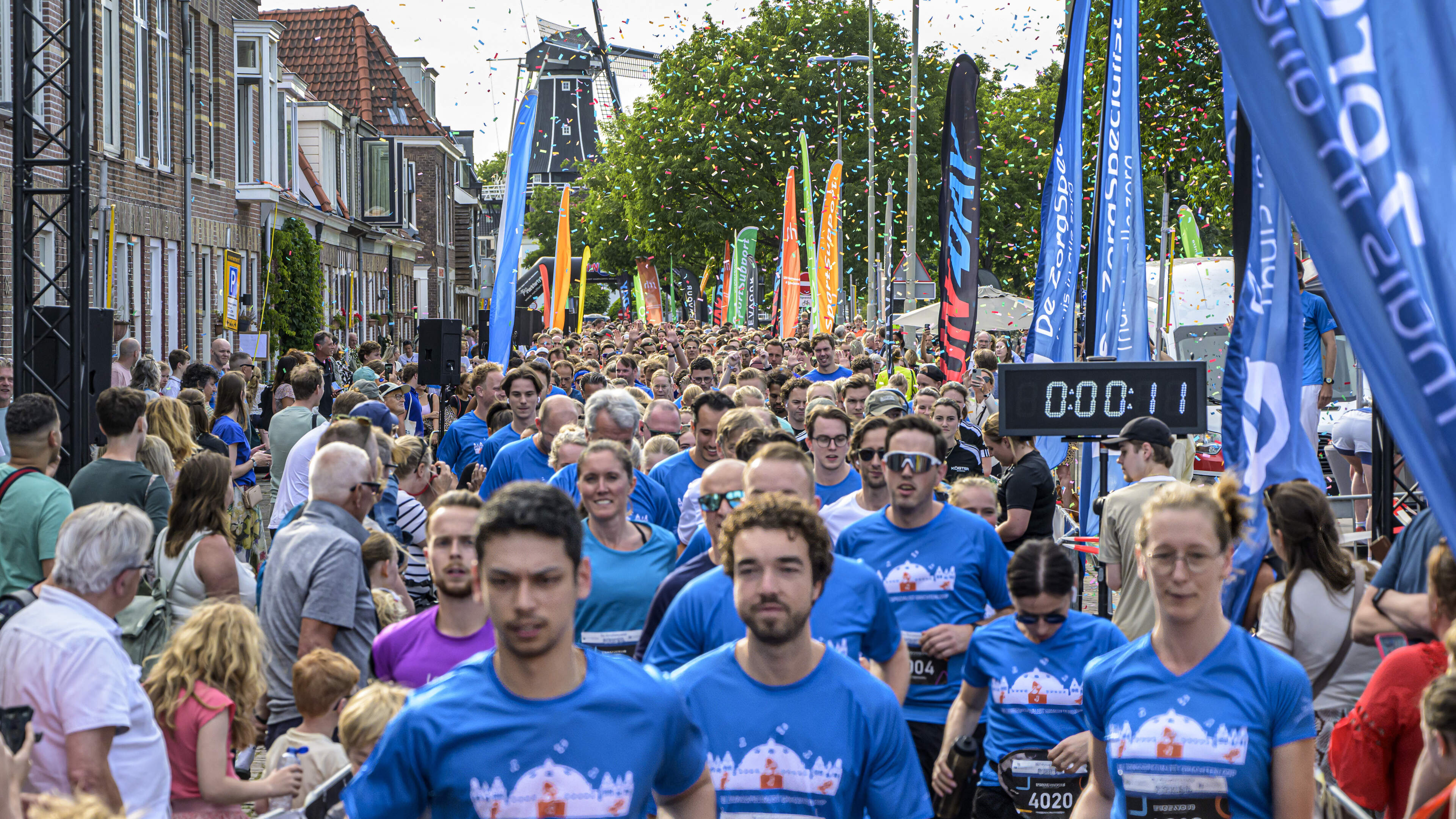 Organisatie Grachtenloop in Haarlem klaar voor tropische dertigste editie, maar onzekerheid over doorgaan blijft: ’Mogelijk 10 kilometer schrappen’