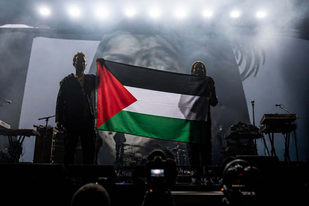 Singapore weert Massive Attack na Palestijnse vlag en leuze tijdens optreden
