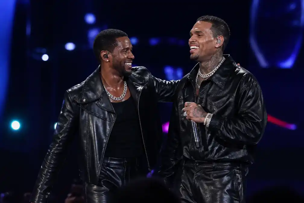 Usher ontkent dubbelganger bij concert in New Jersey met Chris Brown