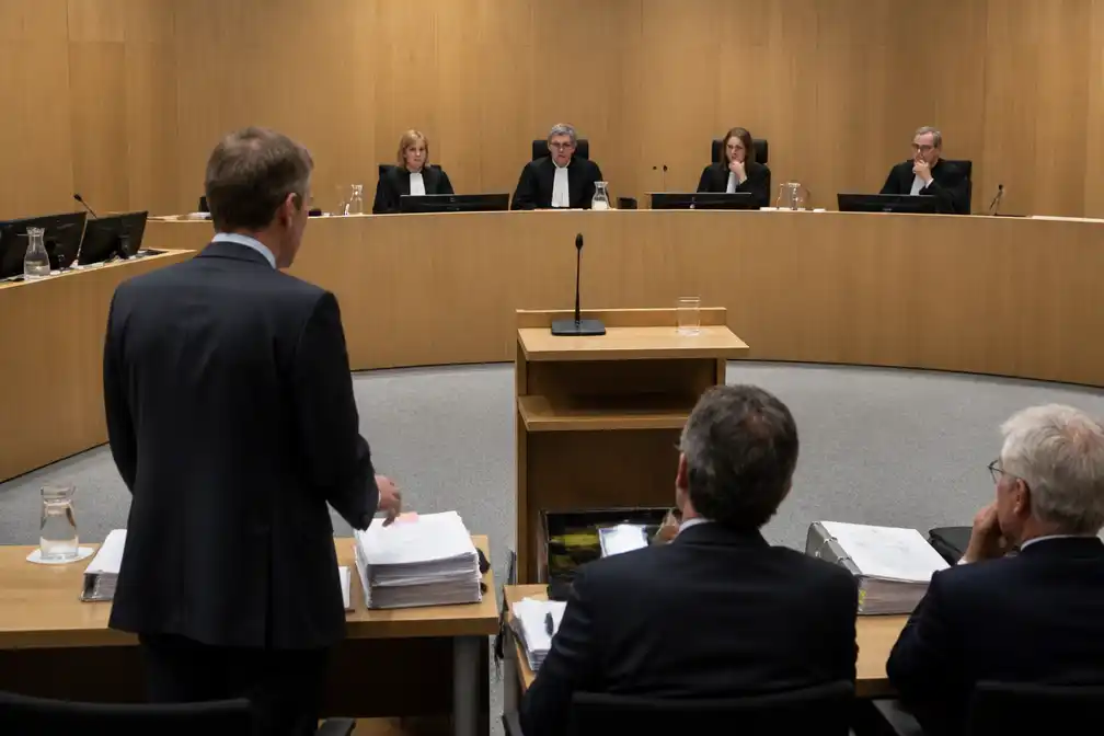VEB valt OCI aan om voorgenomen fusie met Orascom tijdens zitting