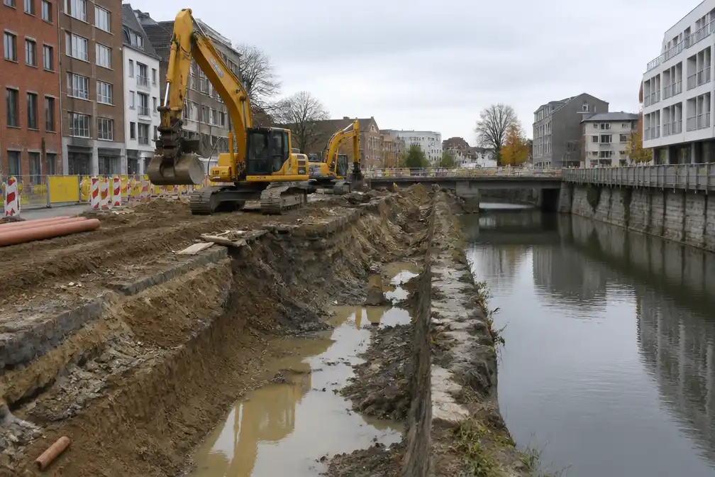 Werken om ingekokerde Mandel tussen Emelgembrug en centrumbrug in Izegem volop aan de gang